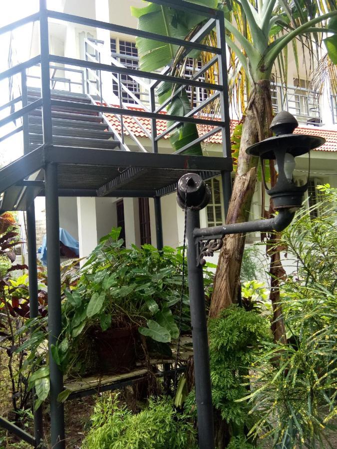 Apartamento Coconut Grove Kochi Habitación foto
