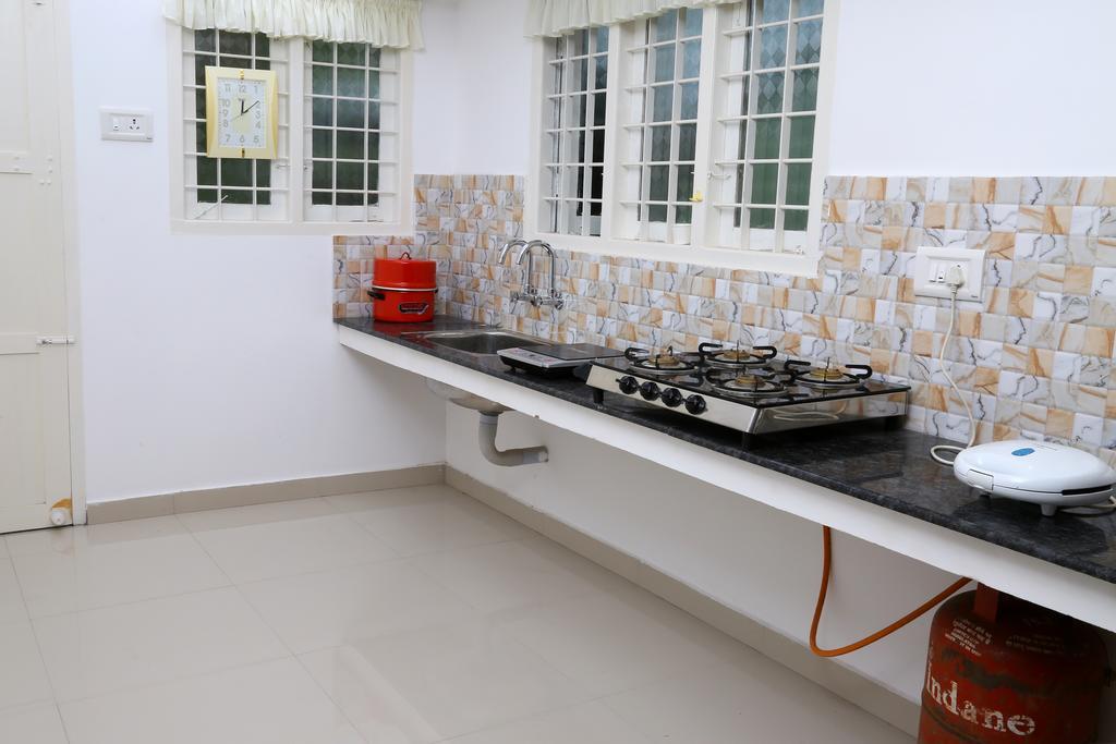 Apartamento Coconut Grove Kochi Habitación foto