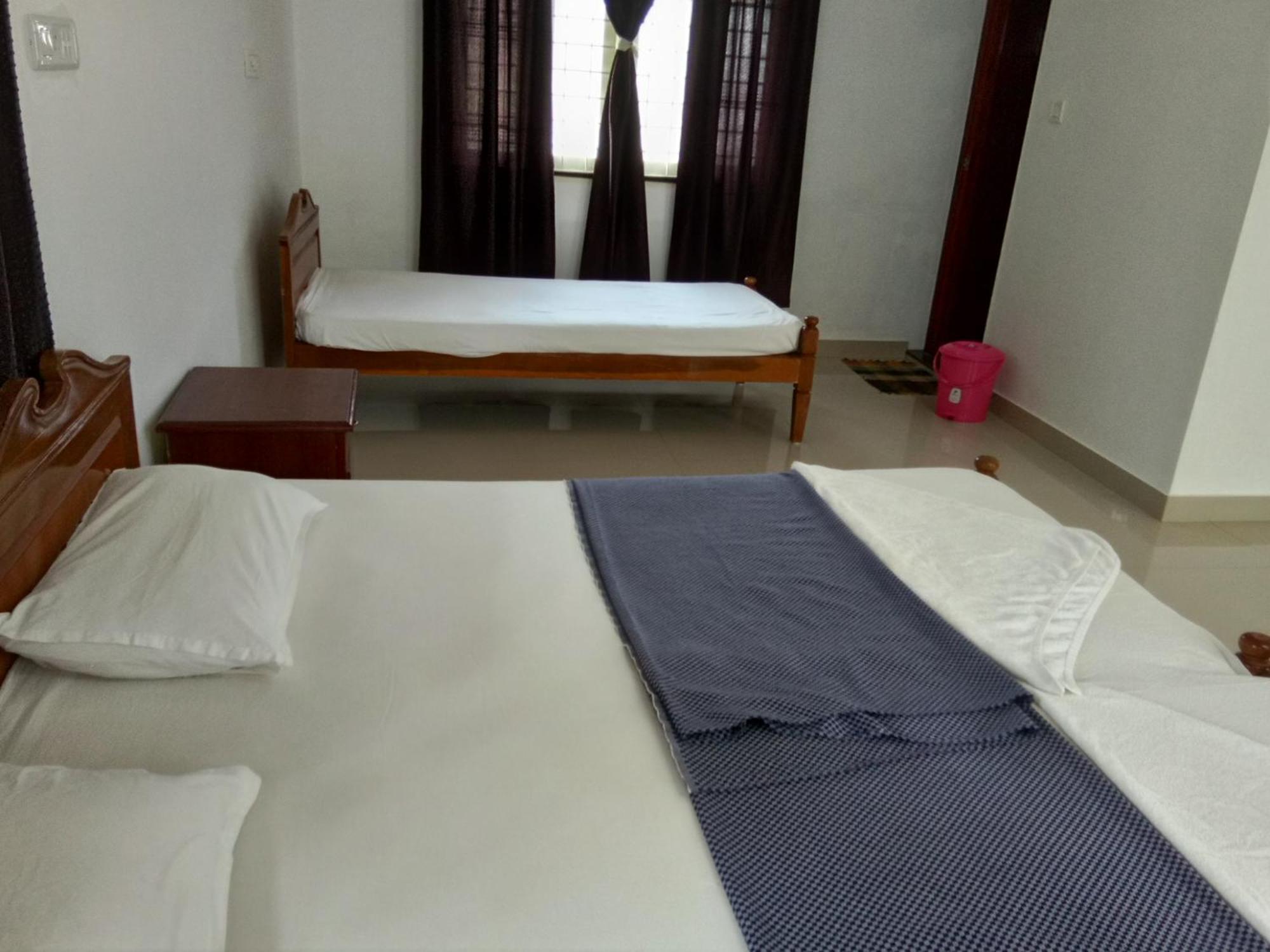 Apartamento Coconut Grove Kochi Habitación foto